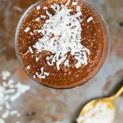 Dairy Free Homemade Chocolate Pudding with Coconut Flakes on Gold Spoon